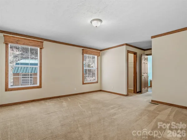 an empty room with windows