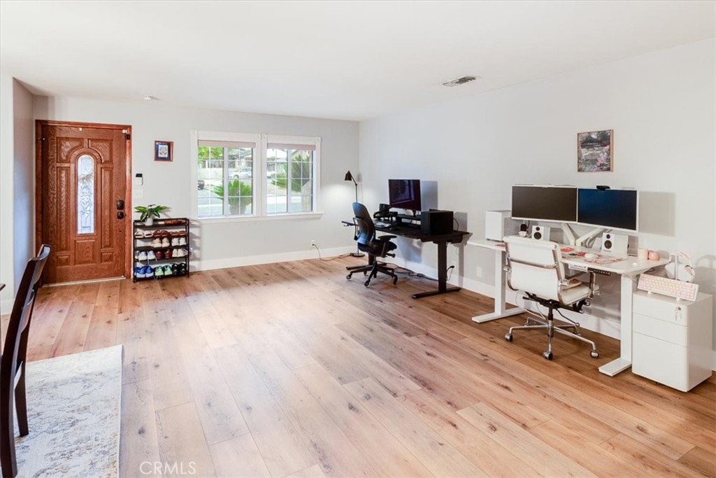 9541 Mandeville Road Santee, CA 92071 - Photo 3 of 46 a view of a workspace with furniture and a window