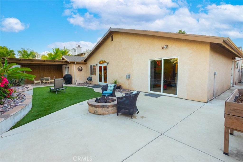 9541 Mandeville Road Santee, CA 92071 - Photo 37 of 46 a front view of house with yard and outdoor seating