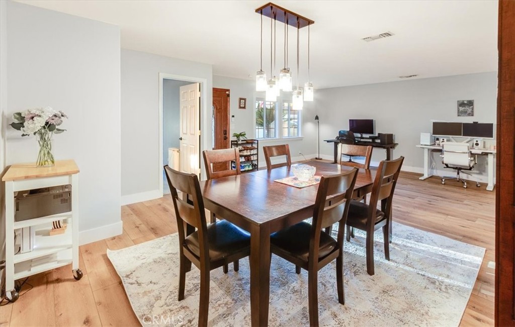 9541 Mandeville Road Santee, CA 92071 - Photo 4 of 46 a view of a dining room with furniture