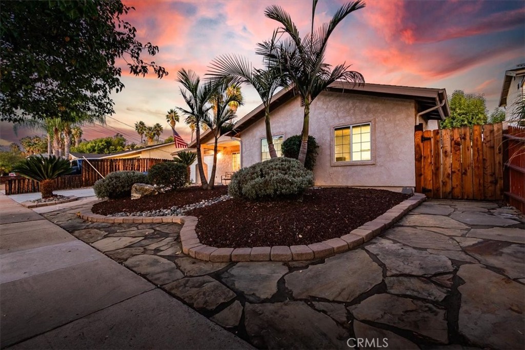 9541 Mandeville Road Santee, CA 92071 - Photo 42 of 46 a front view of a house with garden
