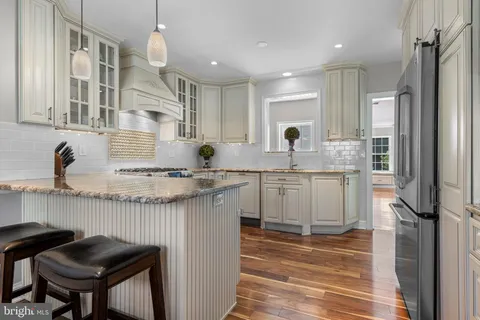 a kitchen with a stove and a sink