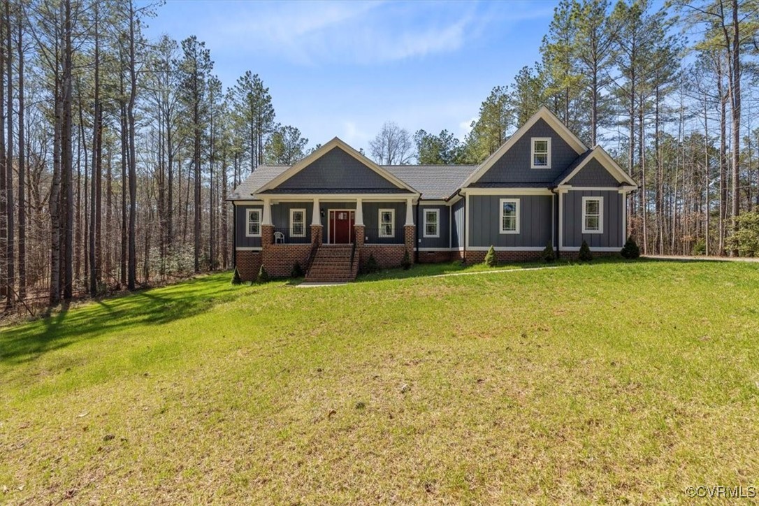 3756 Archies Way Powhatan, VA 23139 - Photo 1 of 44 Craftsman house featuring brick siding, a front ya