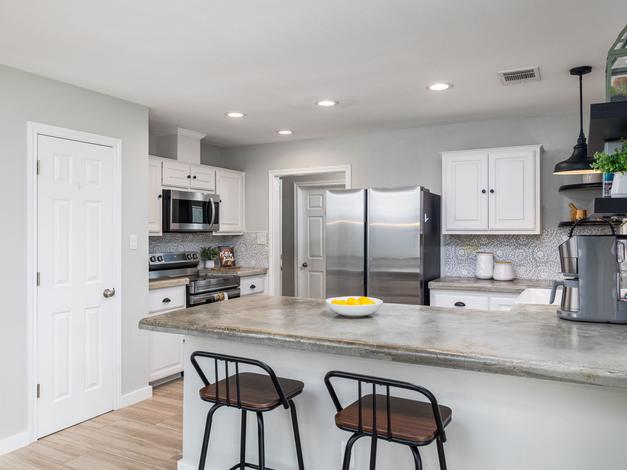 3001 County Road 255 Georgetown, TX 78633 - Photo 13 of 35 A streamlined kitchen provides a perfect setting for culinary adventures and casual dining.