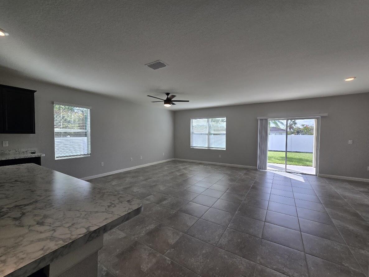 234 Southwest Becker Road Port St. Lucie, FL 34953 - Photo 16 of 44 a view of an empty room and window