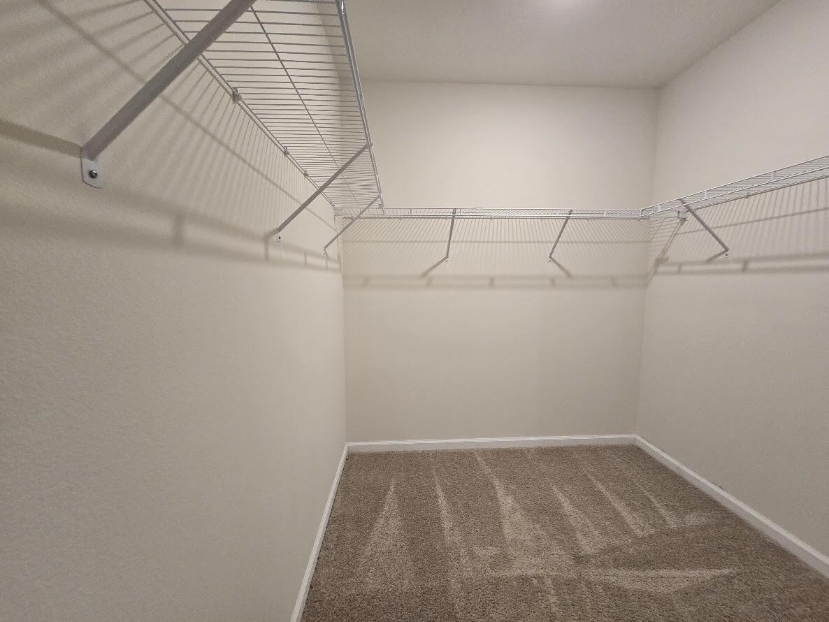 234 Southwest Becker Road Port St. Lucie, FL 34953 - Photo 26 of 44 a view of a room with racks on the wall