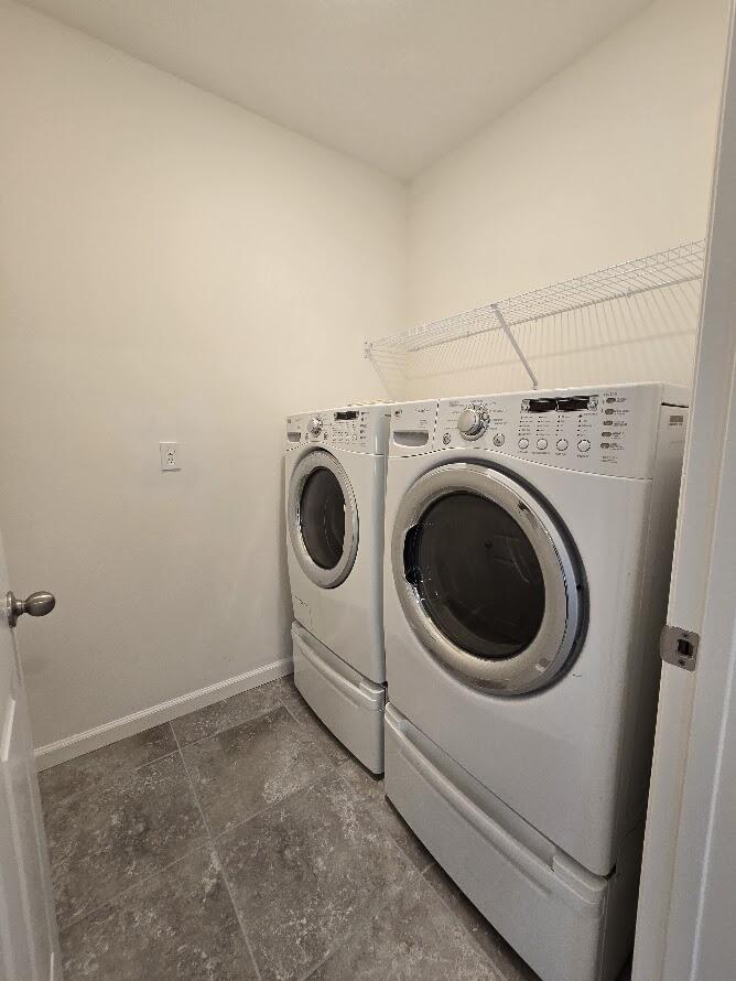 234 Southwest Becker Road Port St. Lucie, FL 34953 - Photo 38 of 44 a utility room with dryer and washer