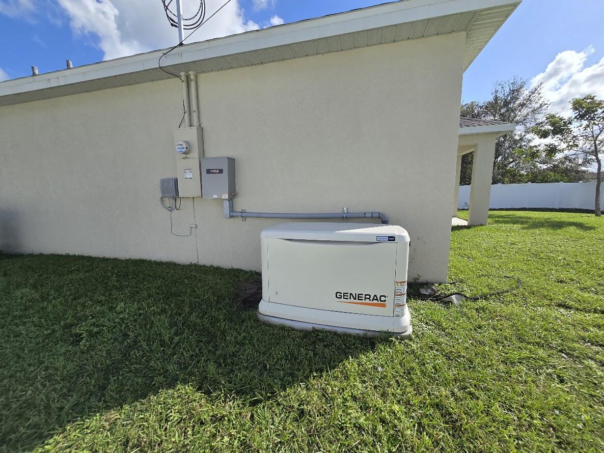 234 Southwest Becker Road Port St. Lucie, FL 34953 - Photo 6 of 44 a view of a backyard