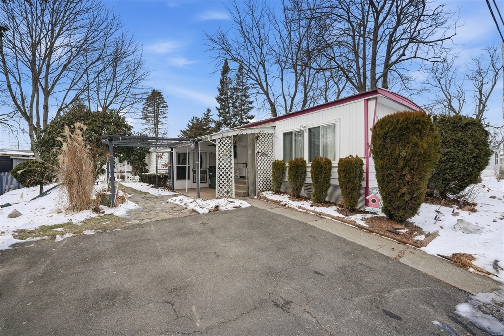 40 Better Way Springfield, MA 01119 - Photo 20 of 25 a view of house with a yard covered in snow