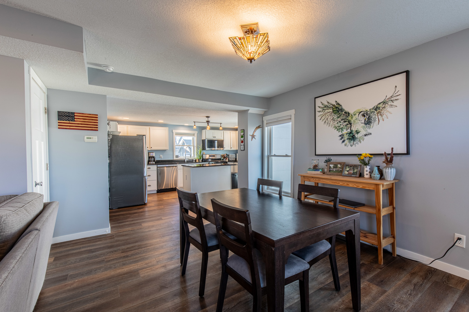 220 2nd Street Wyanet, IL 61379 - Photo 6 of 27 a view of a dining room with furniture and wooden floor