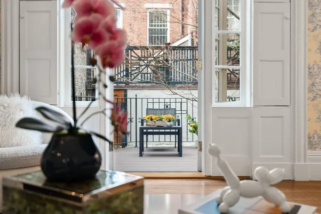 a kitchen with a refrigerator and a sink