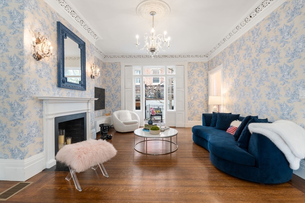 41 Chestnut Street Boston, MA 02108 - Photo 7 of 40 a living room with furniture a chandelier and a fireplace
