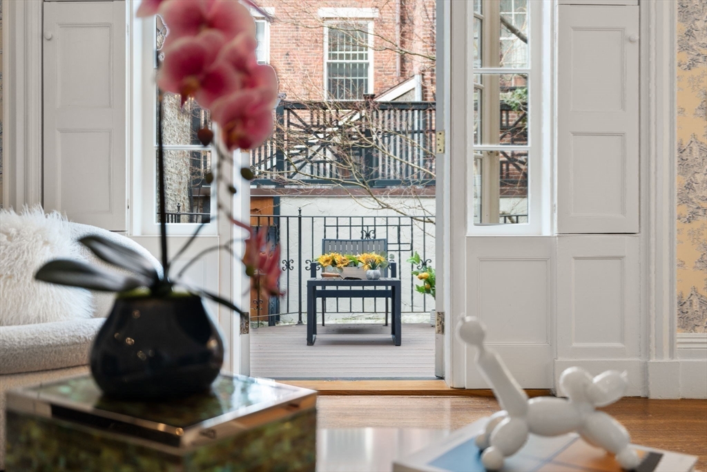 41 Chestnut Street Boston, MA 02108 - Photo 8 of 40 a vase of flowers sitting on a table