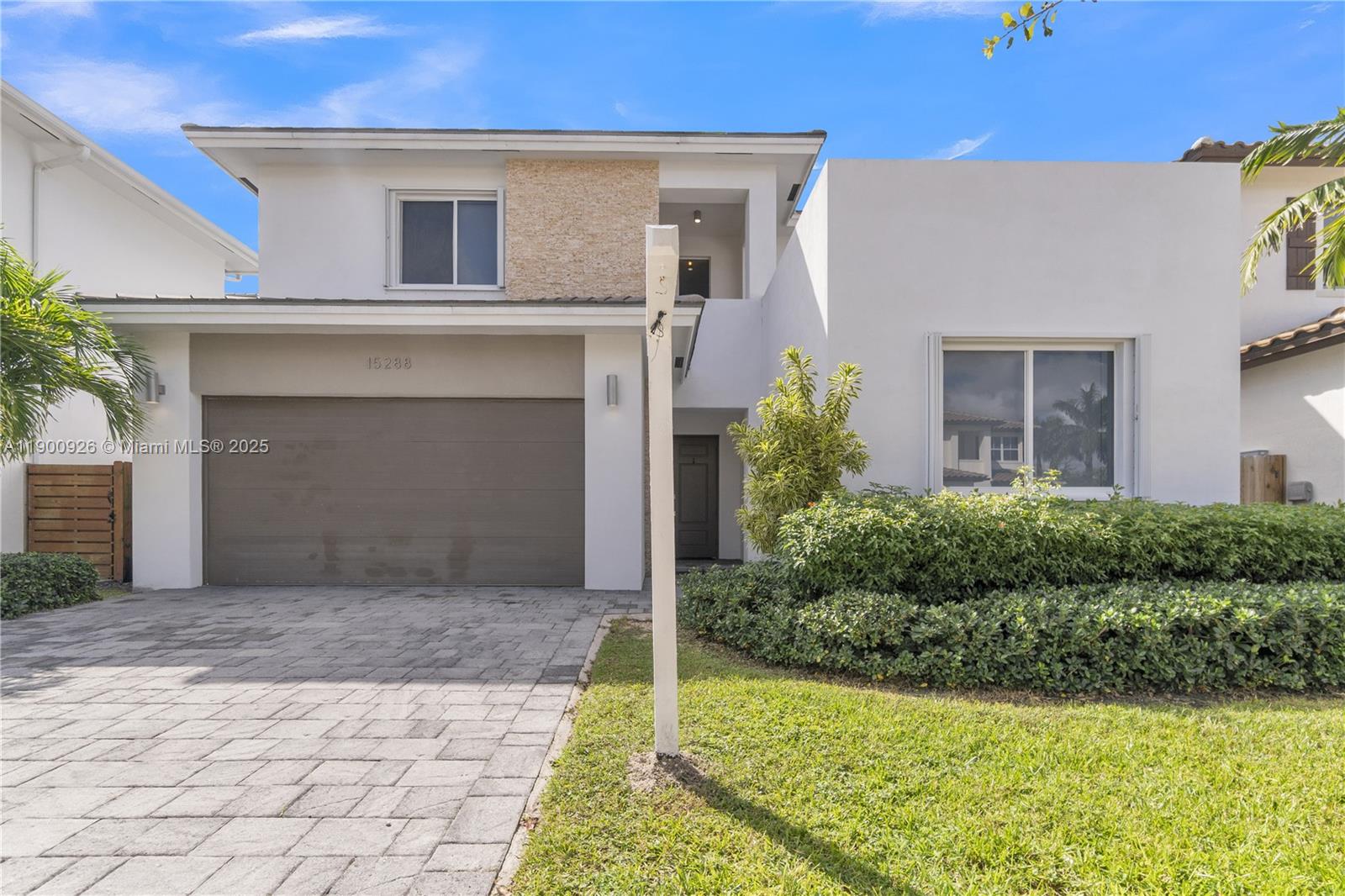 15288 Southwest 176th Terrace Miami, FL 33187 - Photo 11 of 68 a house view with a outdoor space