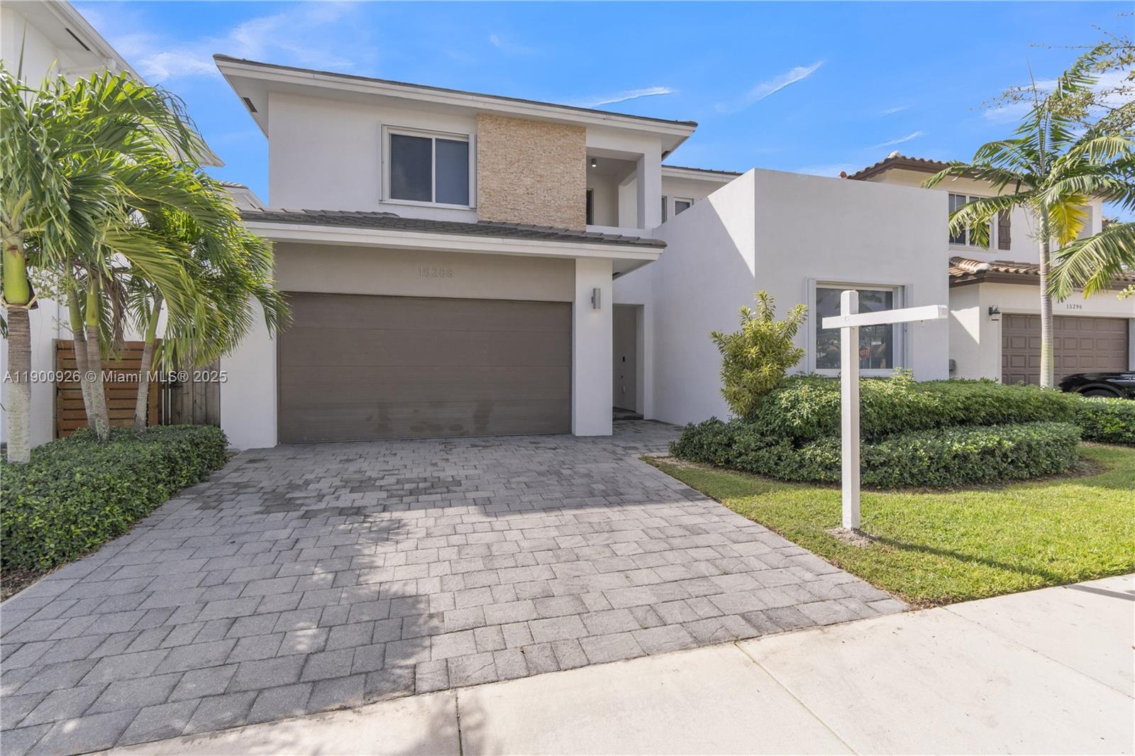 15288 Southwest 176th Terrace Miami, FL 33187 - Photo 12 of 68 front view of a house with a yard