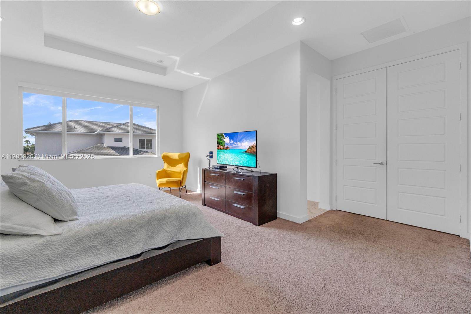 15288 Southwest 176th Terrace Miami, FL 33187 - Photo 21 of 68 a bedroom with a bed and furniture