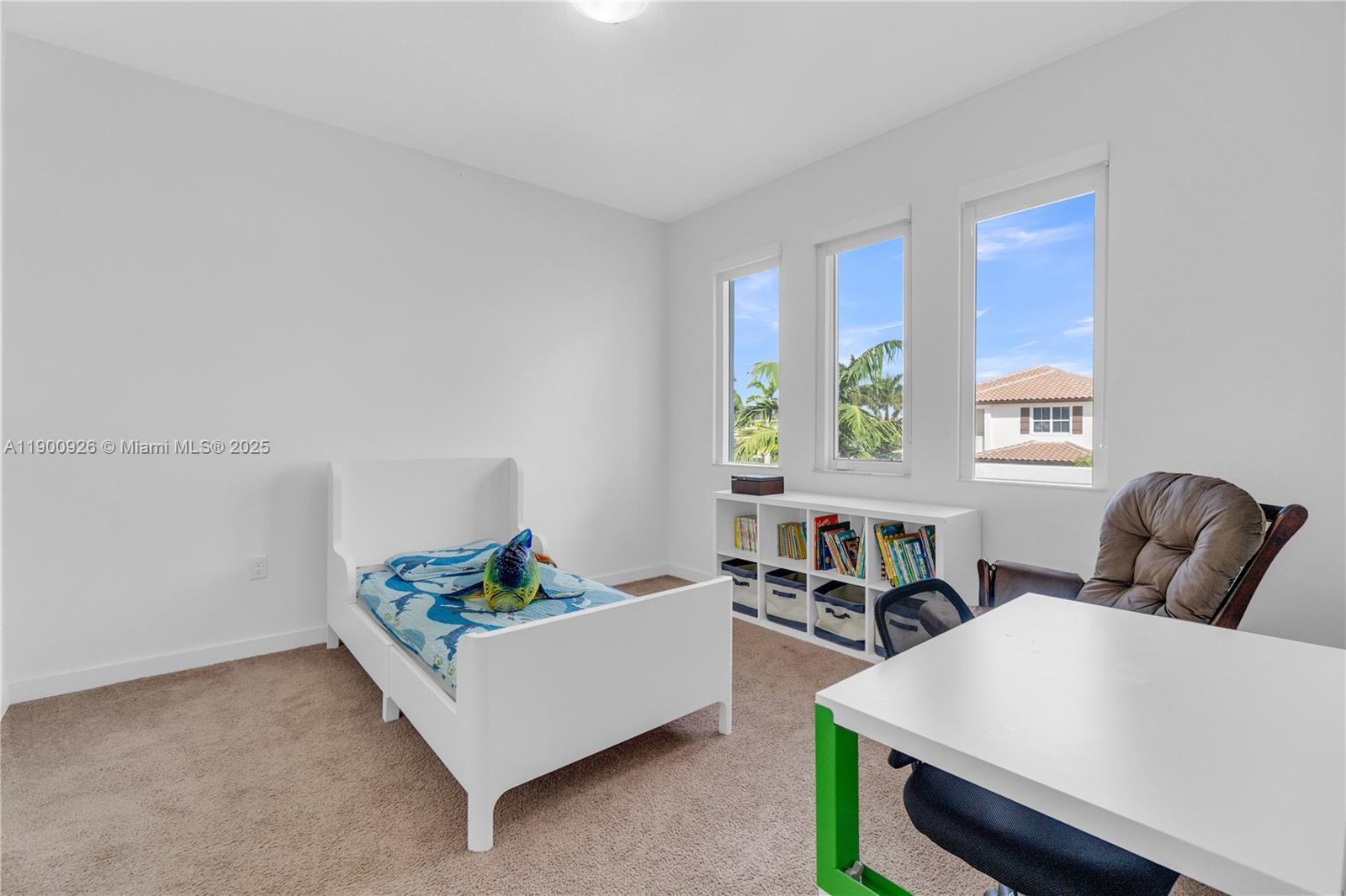 15288 Southwest 176th Terrace Miami, FL 33187 - Photo 32 of 68 a living room with furniture and a potted plant