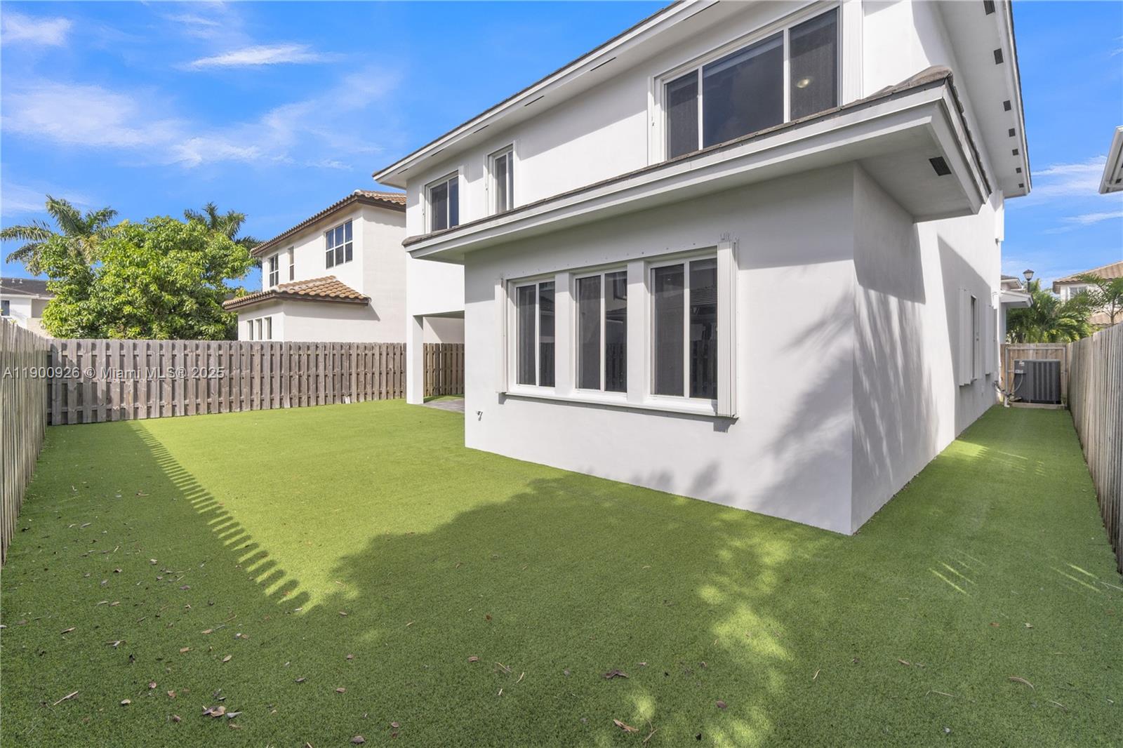 15288 Southwest 176th Terrace Miami, FL 33187 - Photo 53 of 68 a view of an house with backyard and porch