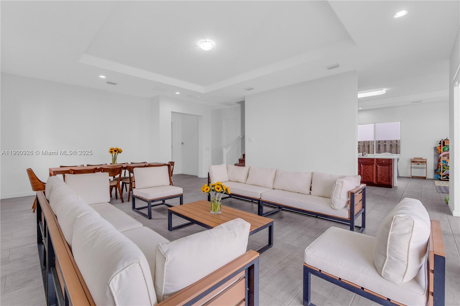 15288 Southwest 176th Terrace Miami, FL 33187 - Photo 6 of 68 a living room with furniture and a table