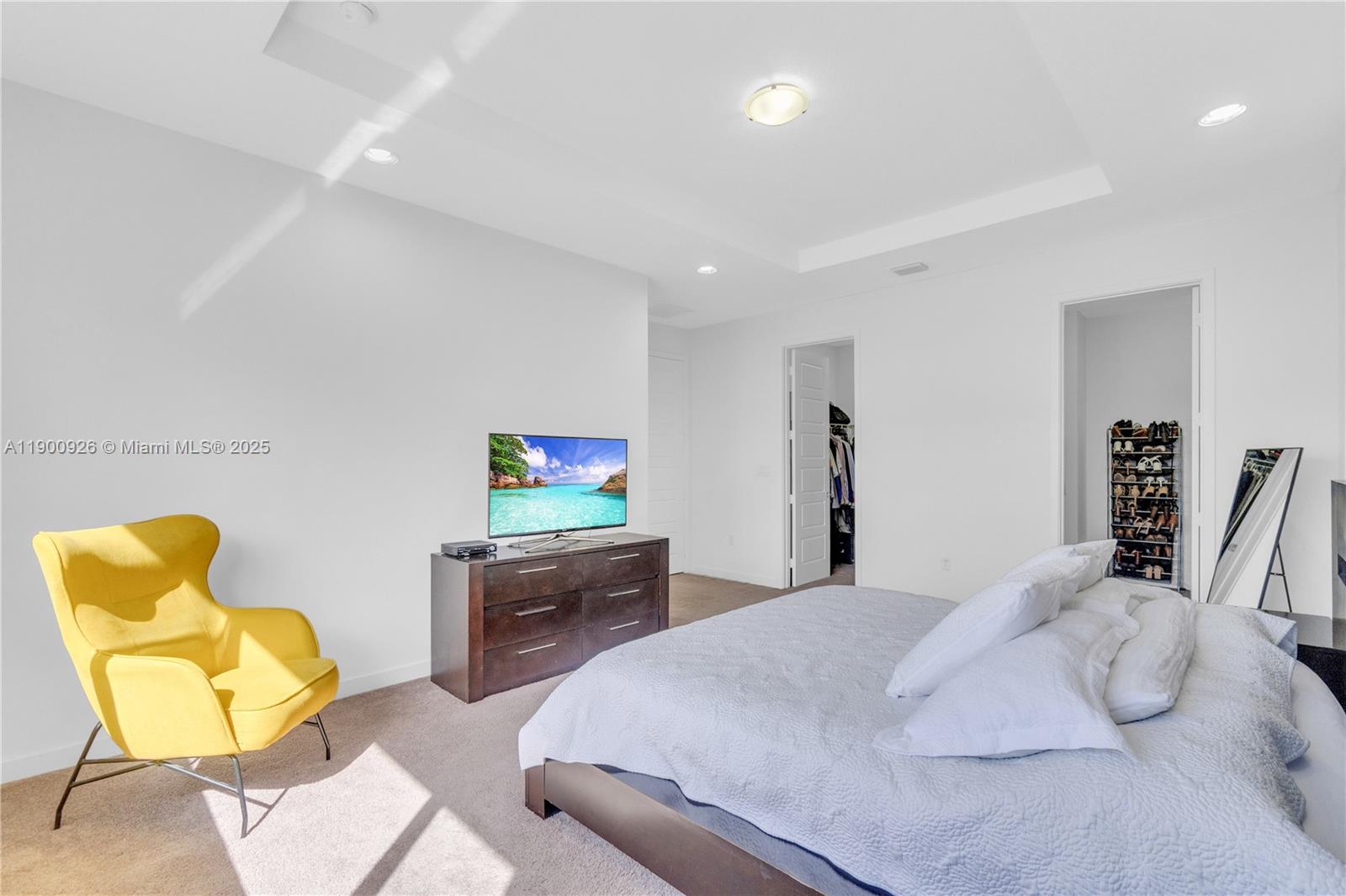 15288 Southwest 176th Terrace Miami, FL 33187 - Photo 7 of 68 a bedroom with a bed and chair