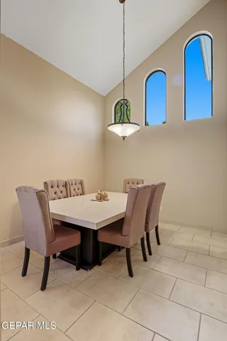 a view of a kitchen with furniture and a stove