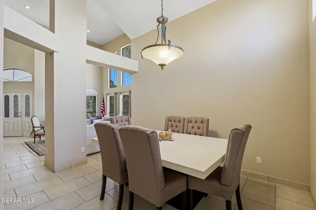 a kitchen with granite countertop stainless steel appliances and cabinets