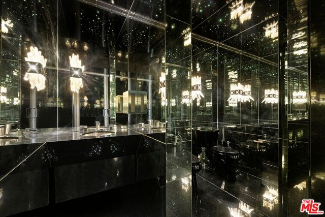 a room with furniture and a flat screen tv