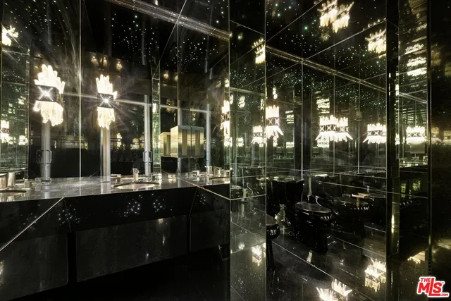 a room with furniture and a flat screen tv