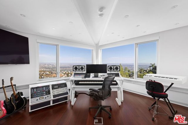 a kitchen with table and chairs