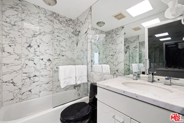 a view of a house with swimming pool and yard