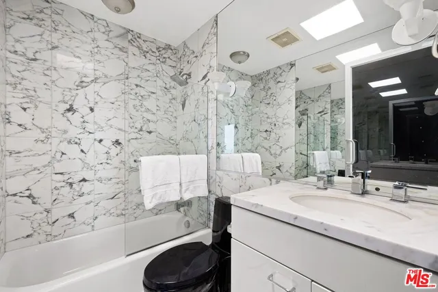 a view of a house with swimming pool and yard