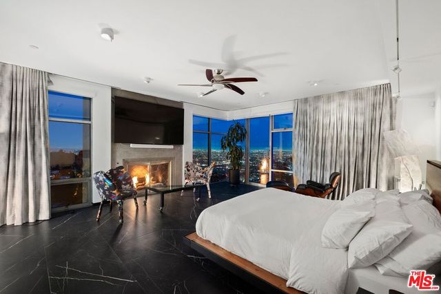 a view of a livingroom with furniture and window