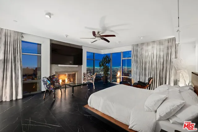 a view of a livingroom with furniture and window