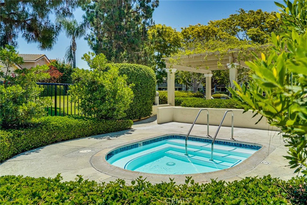 49 East Yale Loop, Unit 26 Irvine, CA 92604 - Photo 63 of 63 a view of a backyard with plants and outdoor seating