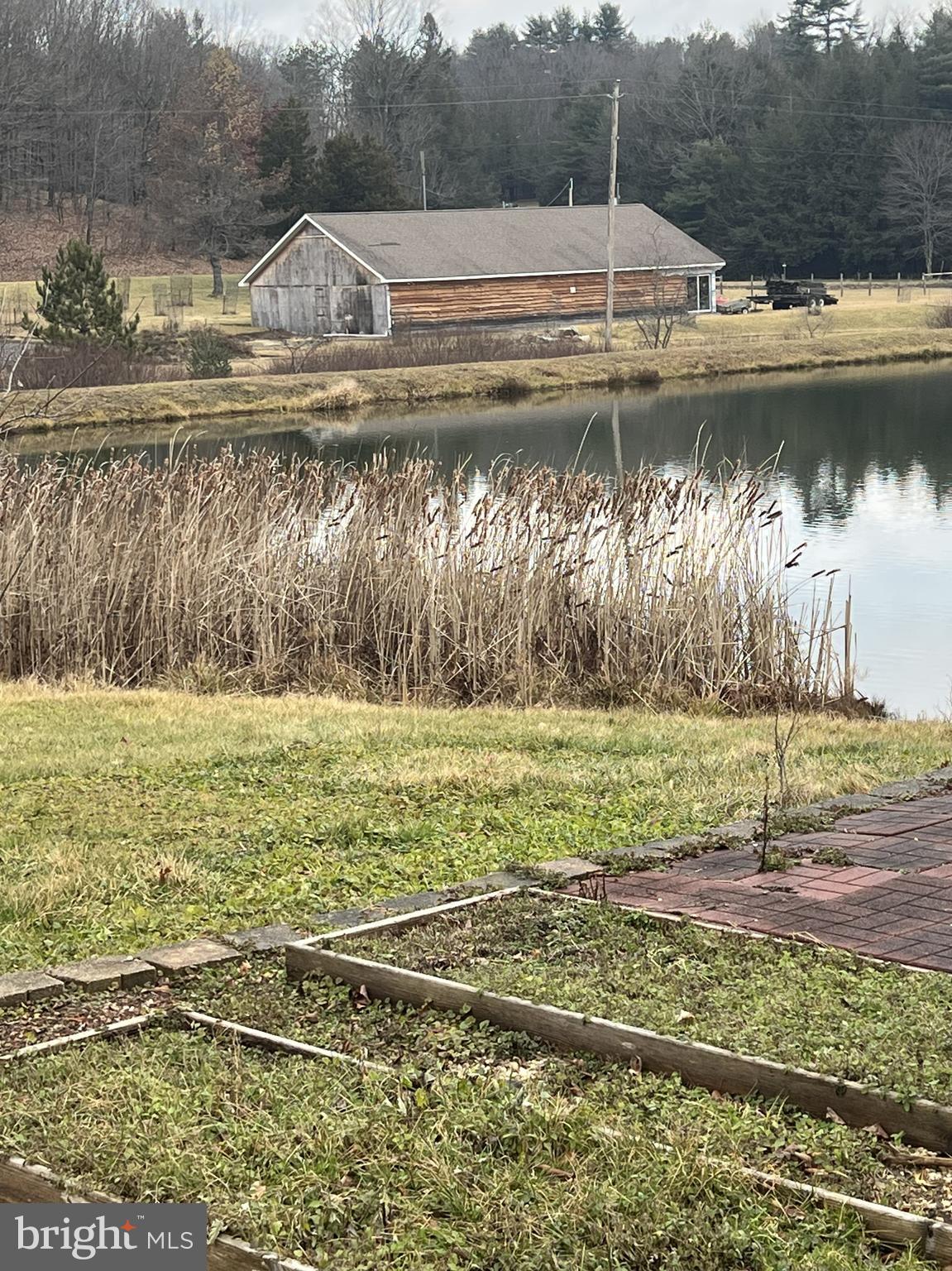 592 Sam Crow Road Lonaconing, MD 21539 - Photo 2 of 2 a view of swimming pool with a yard