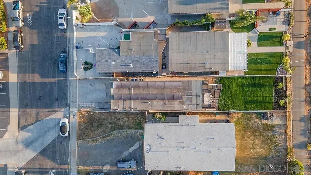 378 7th Street Imperial Beach, CA 91932 - Photo 34 of 41 an aerial view of residential houses with outdoor space and parking