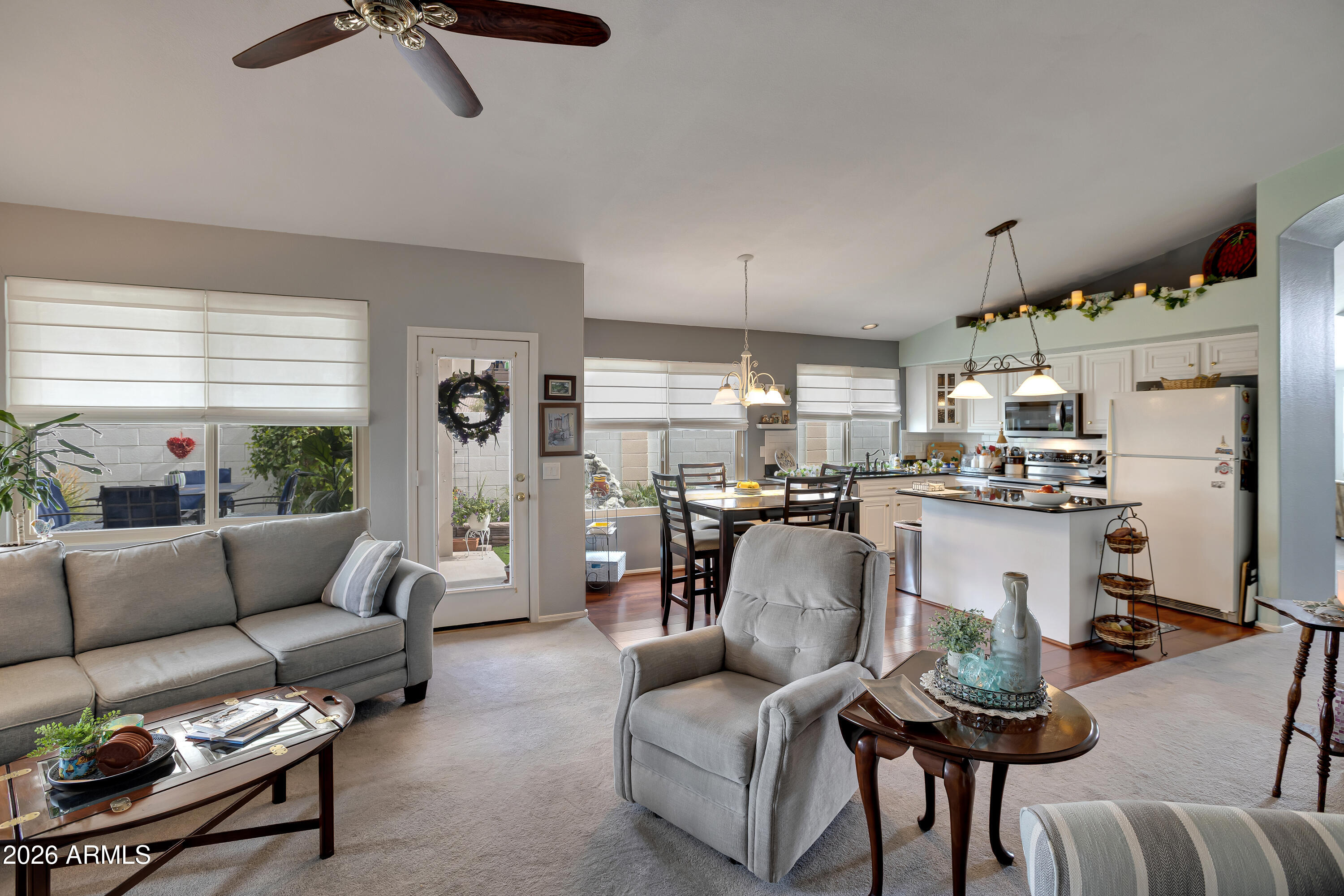 558 East Devon Drive Gilbert, AZ 85296 - Photo 14 of 42 a living room with furniture and a large window