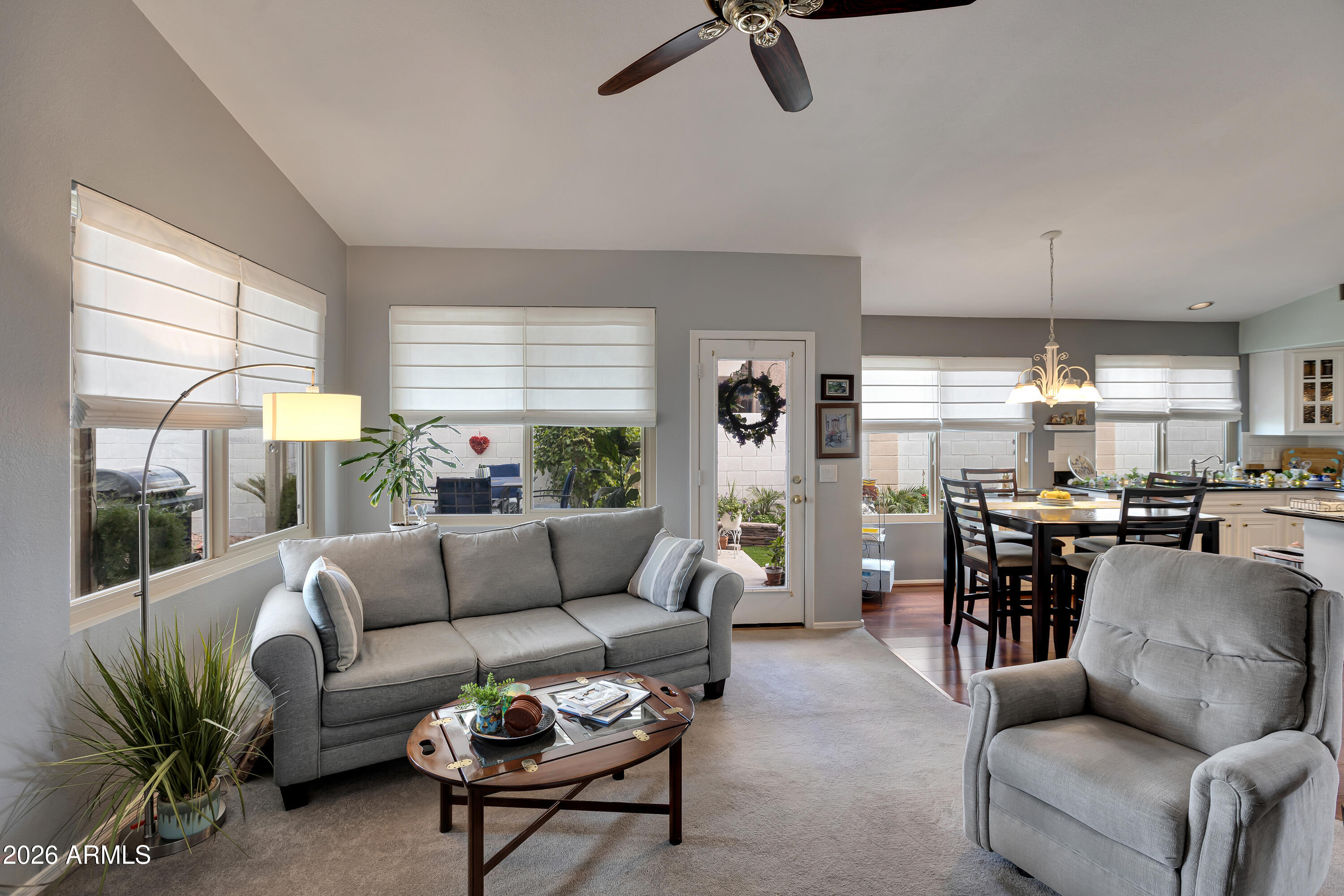 558 East Devon Drive Gilbert, AZ 85296 - Photo 15 of 42 a living room with furniture and a large window