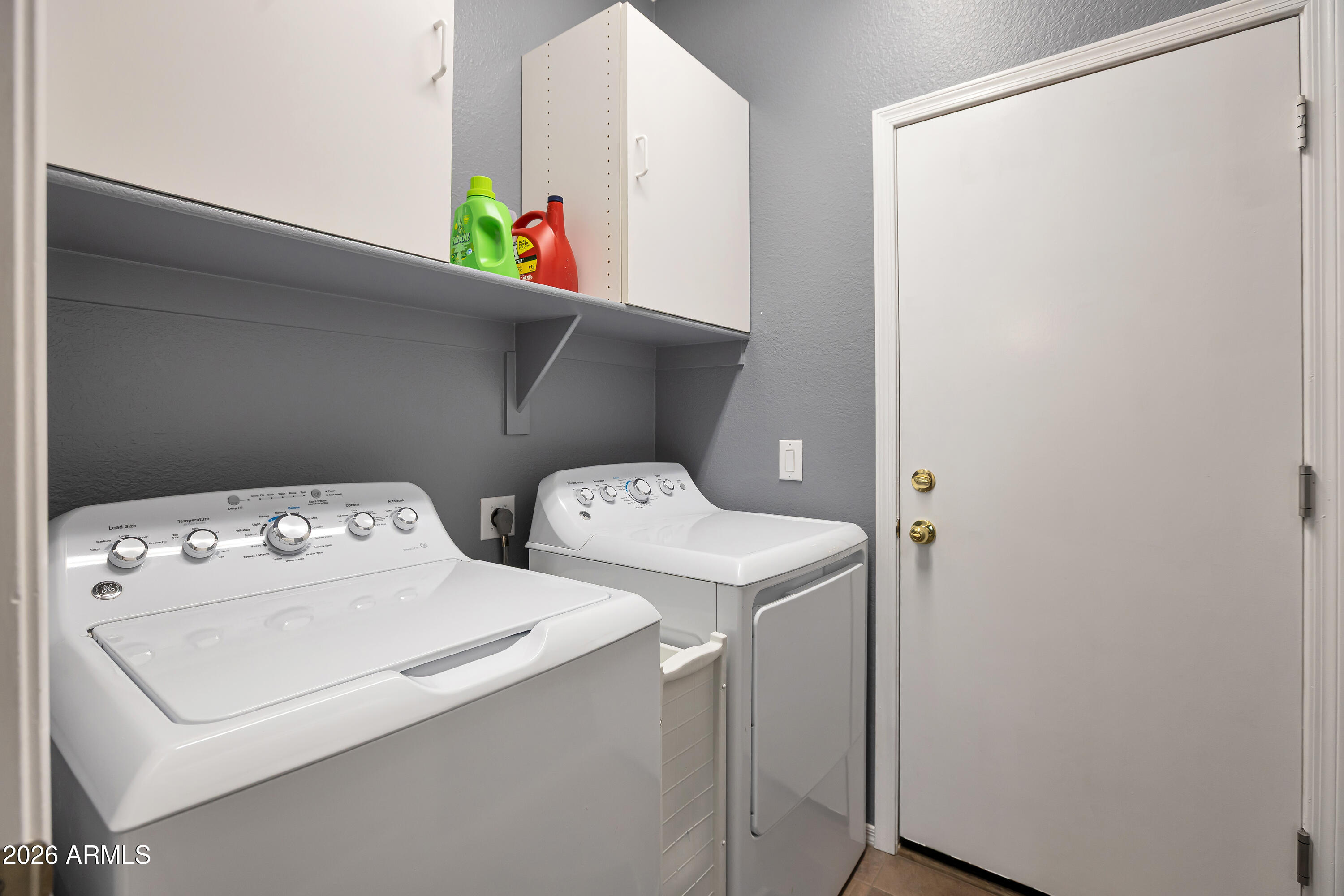 558 East Devon Drive Gilbert, AZ 85296 - Photo 18 of 42 a utility room with dryer and washer