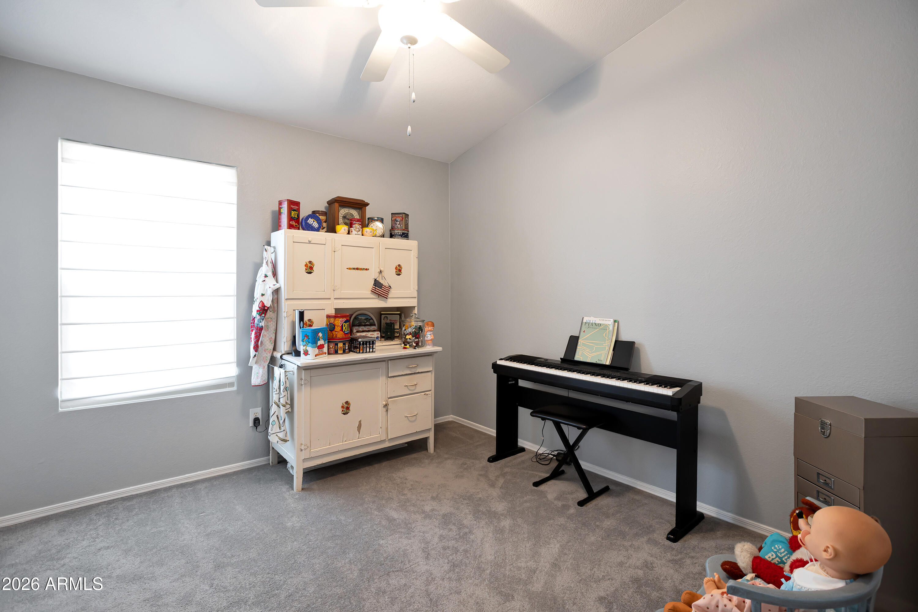 558 East Devon Drive Gilbert, AZ 85296 - Photo 21 of 42 a room with toys and a window