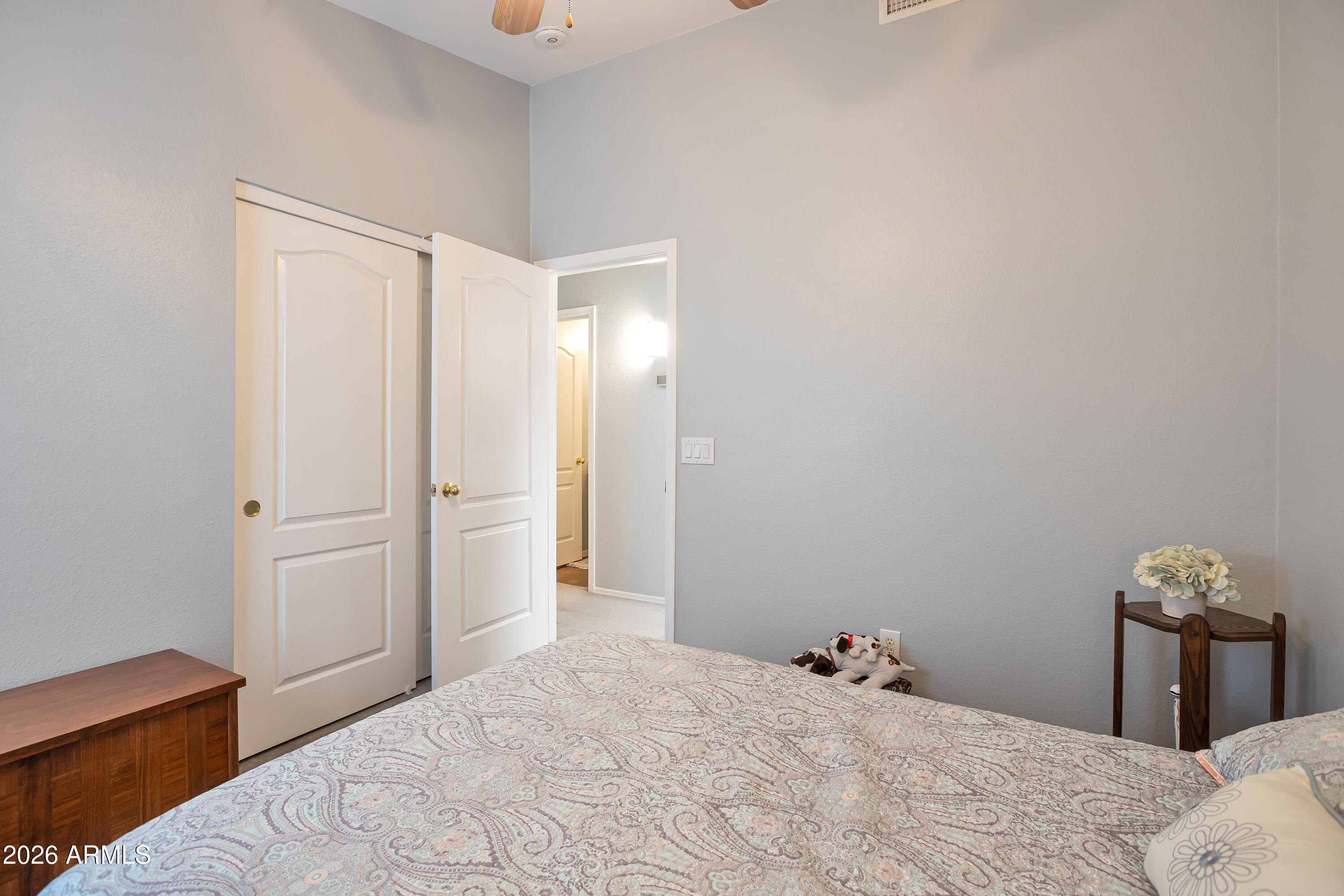 558 East Devon Drive Gilbert, AZ 85296 - Photo 23 of 42 a bedroom with a bed and a closet