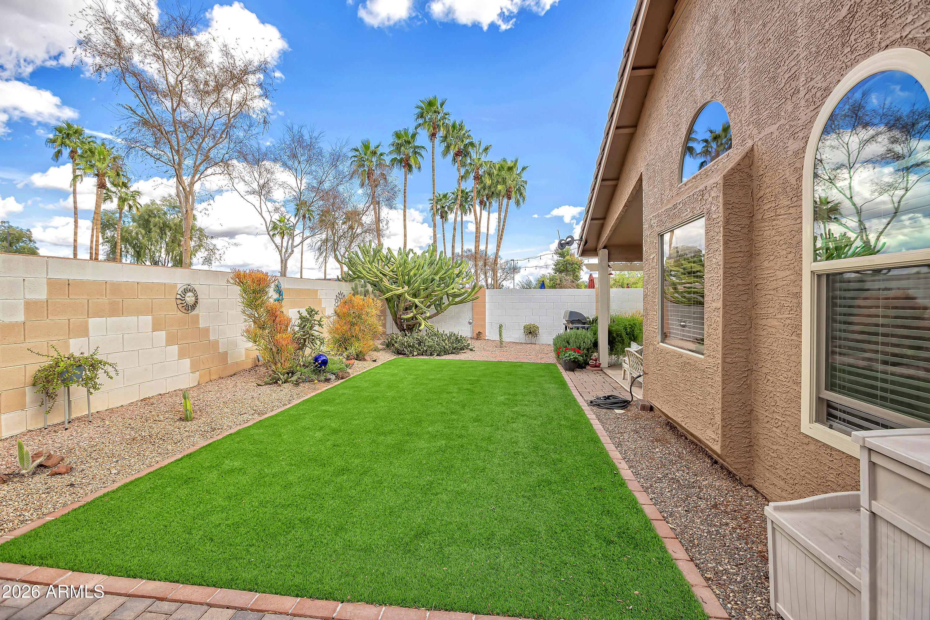 558 East Devon Drive Gilbert, AZ 85296 - Photo 37 of 42 a view of a back yard of the house