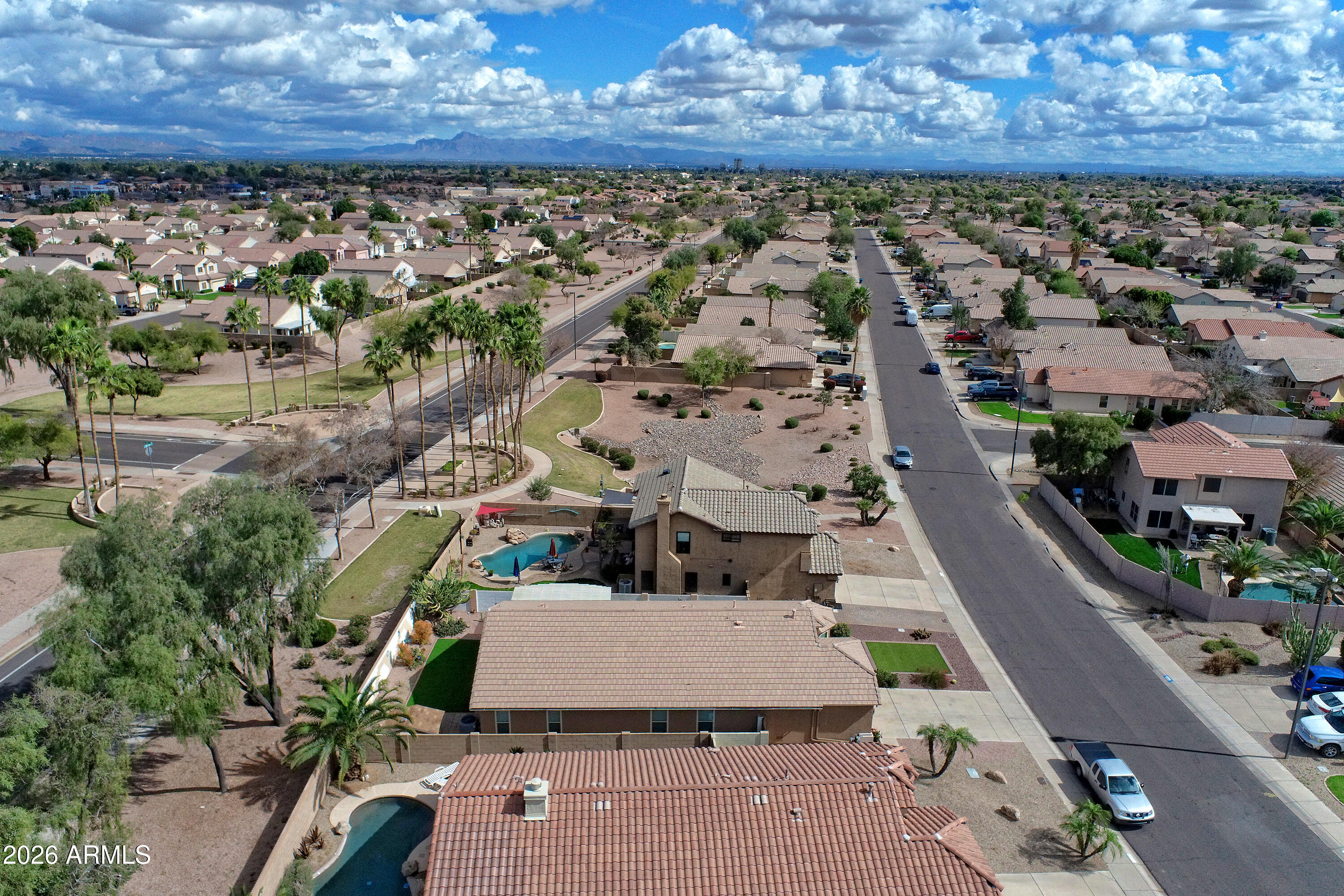 558 East Devon Drive Gilbert, AZ 85296 - Photo 42 of 42 an aerial view of residential houses with outdoor space