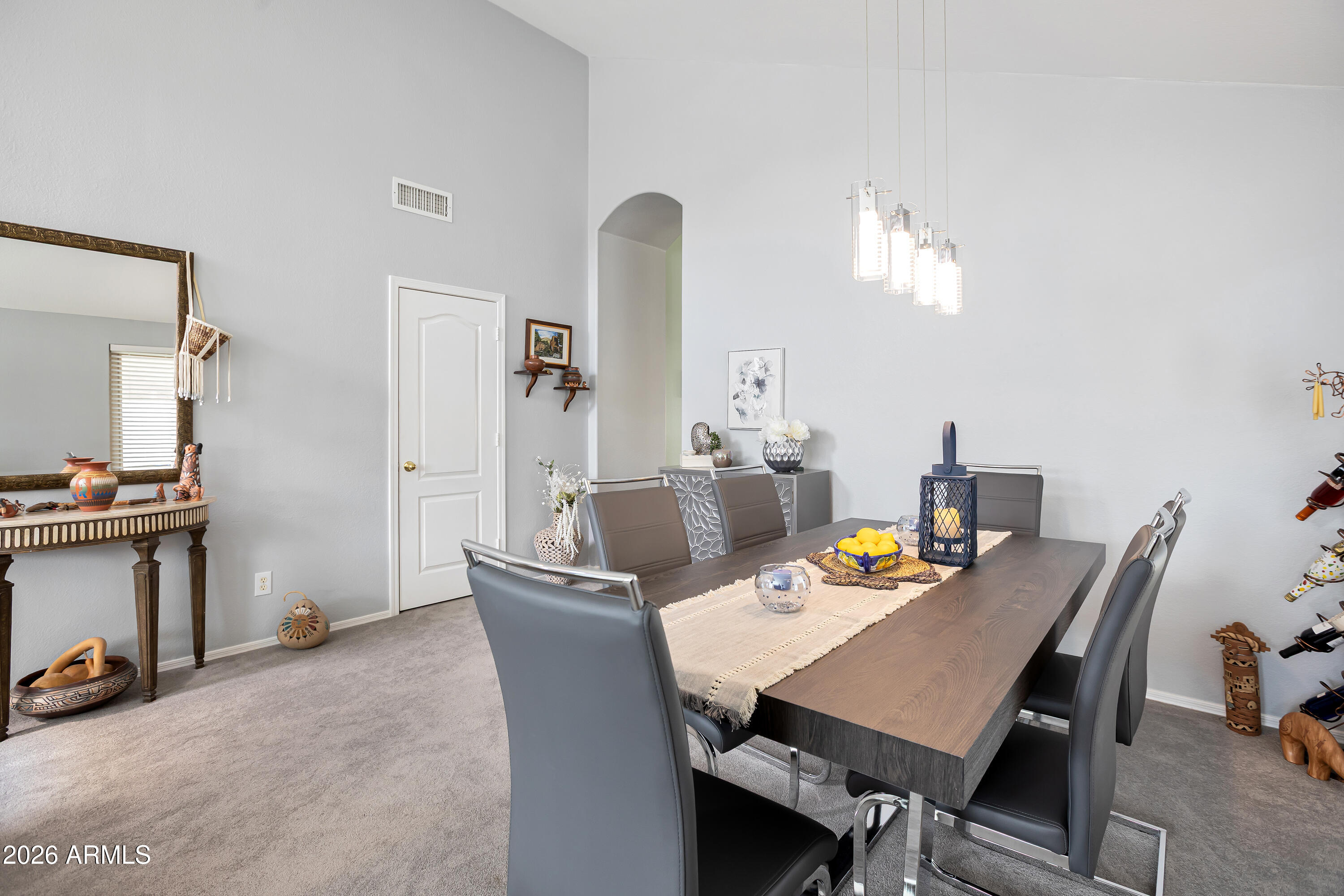 558 East Devon Drive Gilbert, AZ 85296 - Photo 5 of 42 a view of a dining room with furniture
