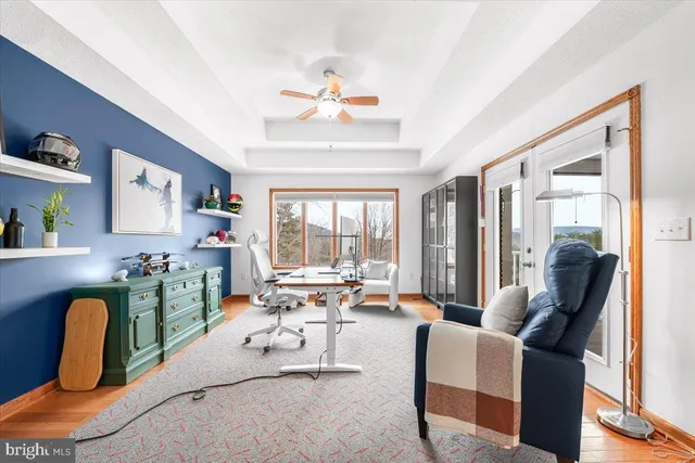 a view of a garage with parked cars