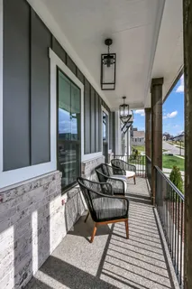 a building outdoor space with patio furniture