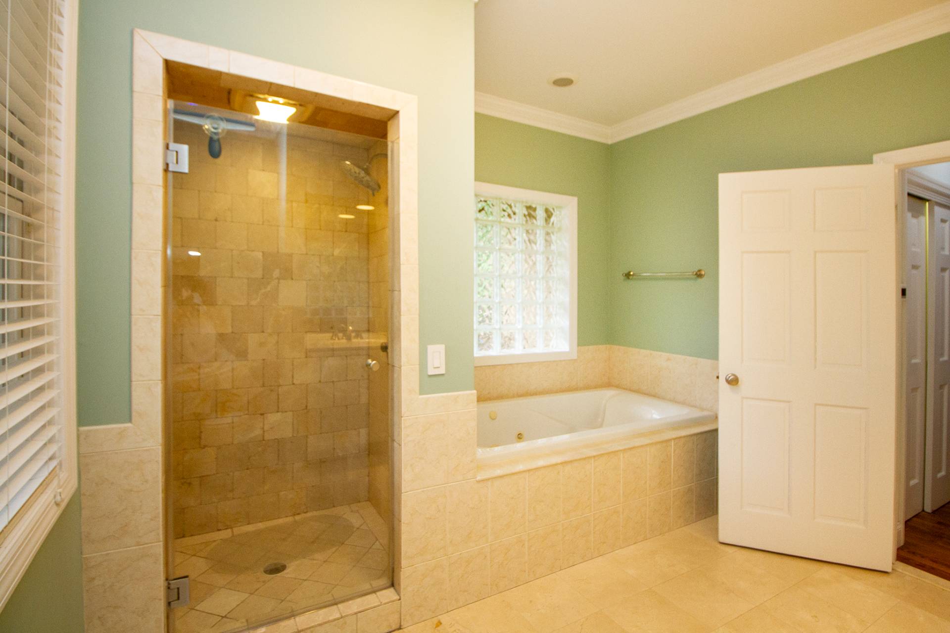 49 Bridle Path Westhampton Beach, NY 11978 - Photo 13 of 29 a bathroom with a tub a sink and a shower