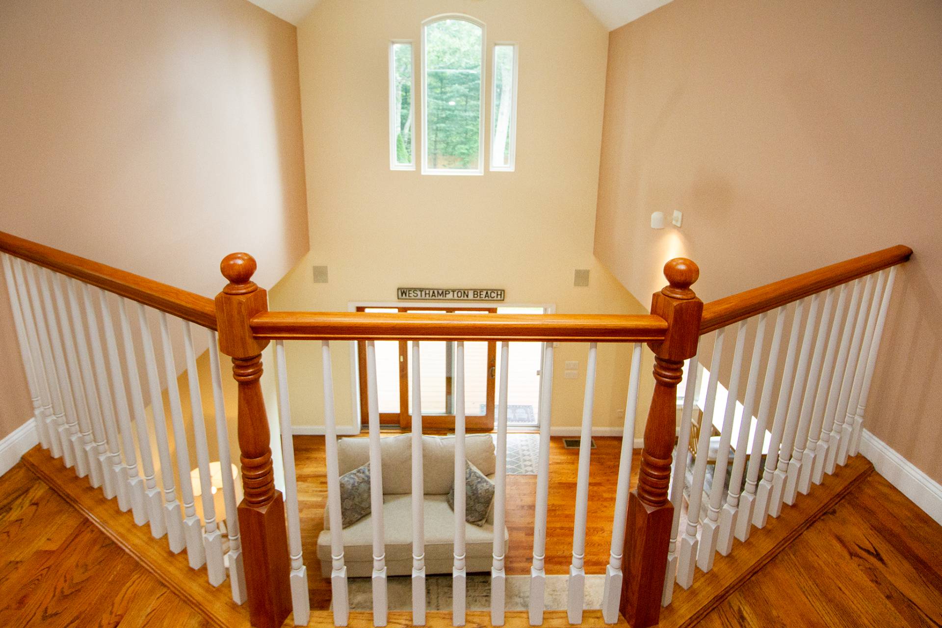 49 Bridle Path Westhampton Beach, NY 11978 - Photo 14 of 29 a view of a porch with wooden floor and stairs