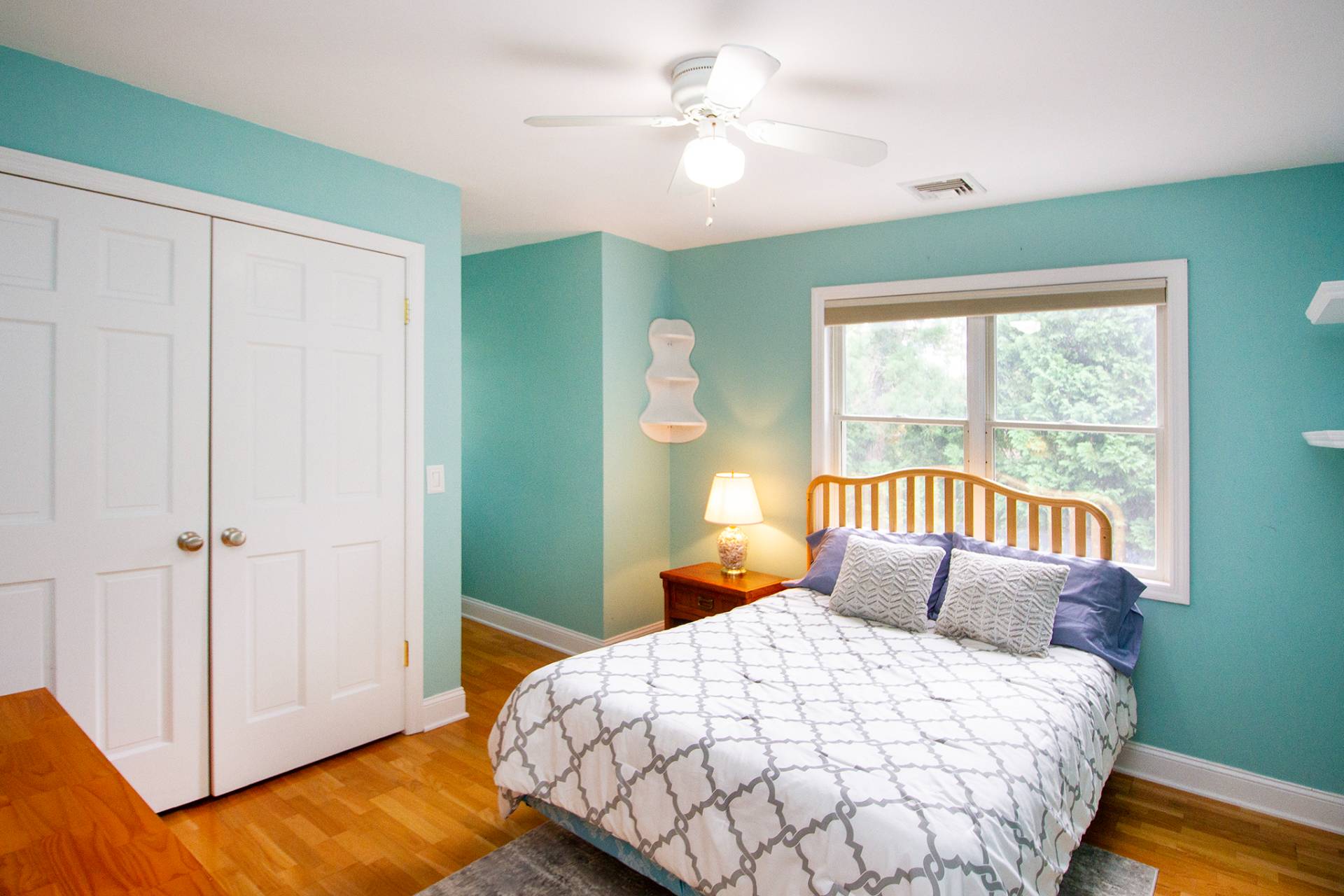 49 Bridle Path Westhampton Beach, NY 11978 - Photo 15 of 29 a bedroom with a large bed and a window