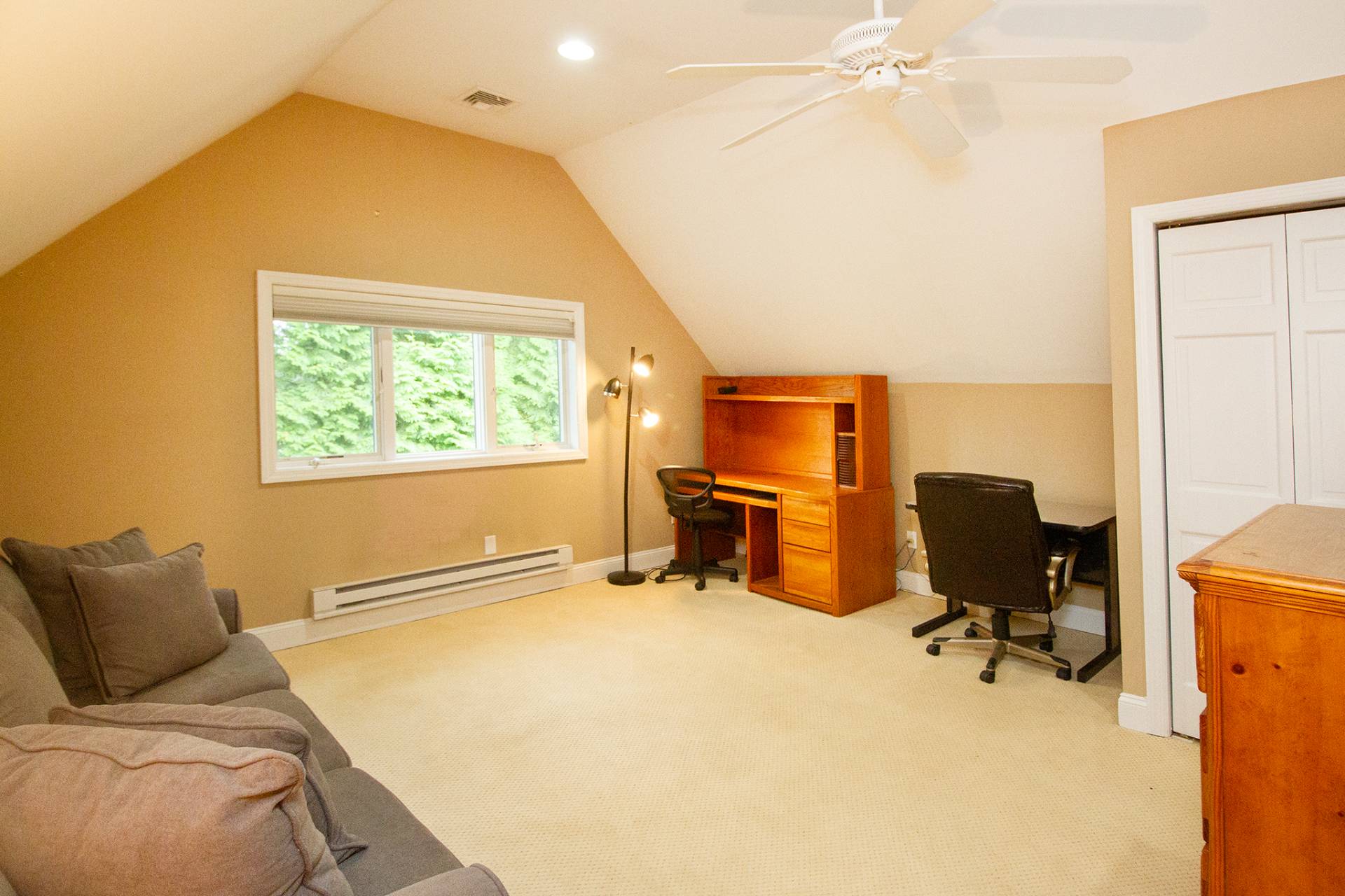 49 Bridle Path Westhampton Beach, NY 11978 - Photo 19 of 29 a bed room with a bed and a chair